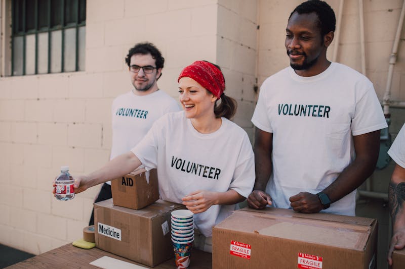 Volunteers packing care boxes
